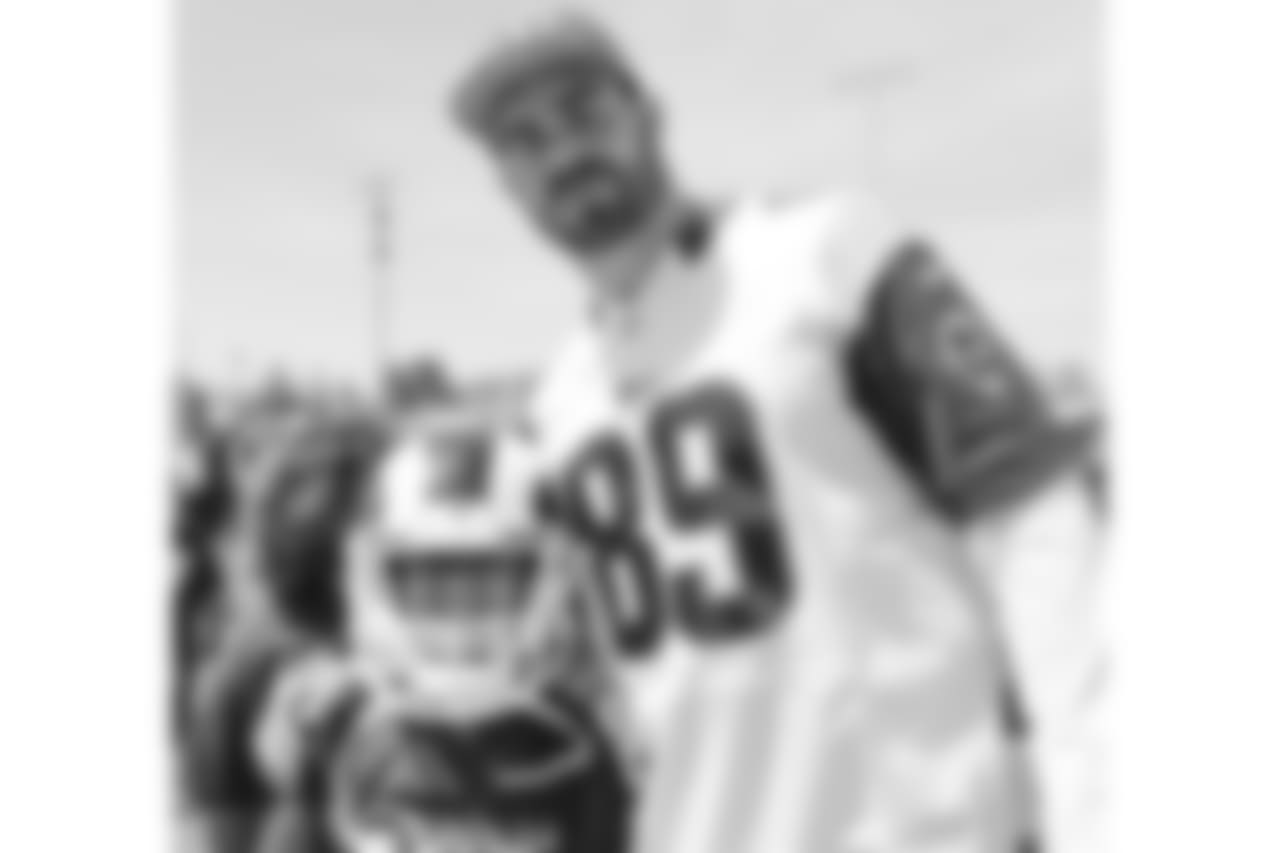 The Los Angeles Rams and NFL Play 60 held their annual field day at William Rolland Stadium on May 4, 2018 in Thousand Oaks, California. There were over a 1,000 elementary school students that came to Field Day. Rams Player tight end #89 Tyler Higbee poses with a child. (Photo By: Daniel Bowyer/Rams)