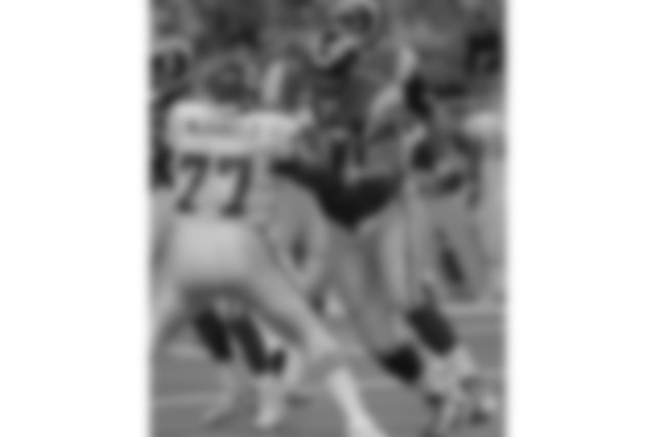 St. Louis Rams Orlando Pace sees his first action as he blocks Kansas City Chiefs' defensive end Pellom McDaniels in the third quarter Friday, Aug. 22, 1997 at the TWA Dome in St. Louis. Pace signed only last Friday after missing all of training camp. (AP Photo/Tom Gannam)