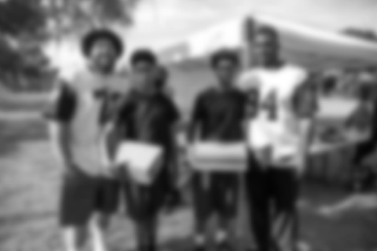 Los Angeles Rams offensive lineman Aaron Neary and defensive lineman John Franklin-Myers surprise the Kayne Era Center bulldogs at practice with football equipment and cleats in Culver City, Calif. on October 2nd, 2018. The Kayne Era Center (KEC) is a nonpublic special education school for students in grades k-12 (Hiro Ueno/Rams).