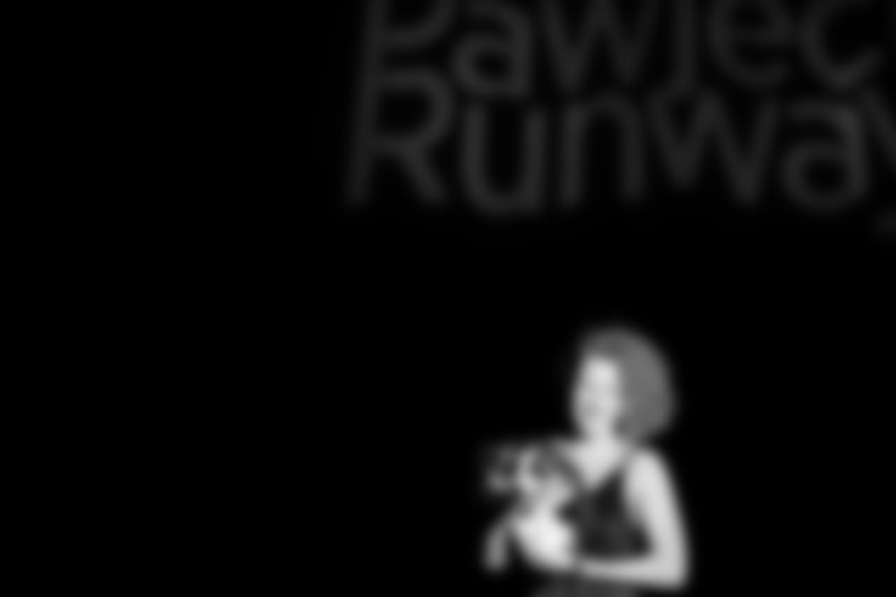The fashion show featured 13 current and former Ravens and other local celebrities strutting down the catwalk with adoptable dogs and cats from the Baltimore Animal Rescue and Care Shelter (BARCS). (Photo: Sid Keiser)