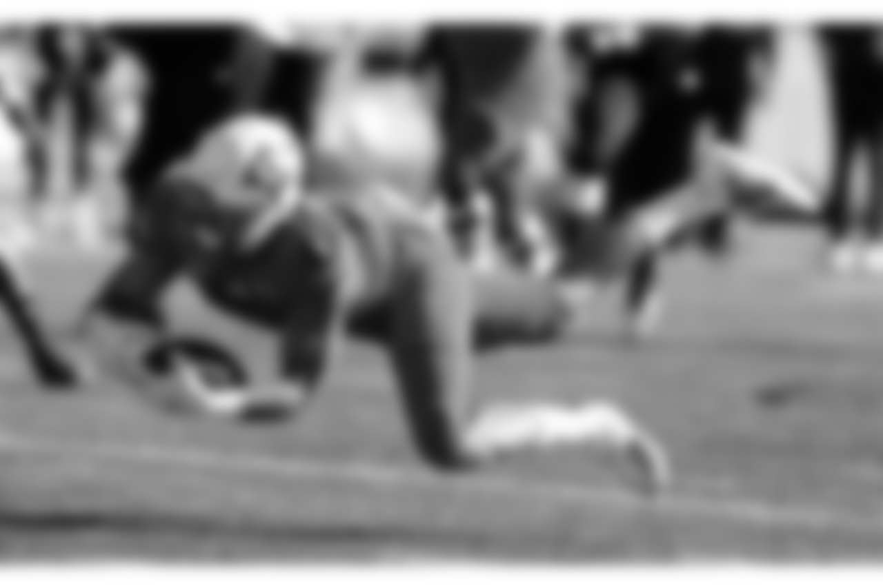 North wide receiver Keelan Doss, of UC Davis, makes a diving catch during the first half of the Senior Bowl college football game, Saturday, Jan. 26, 2019, in Mobile, Ala. (AP Photo/Butch Dill)