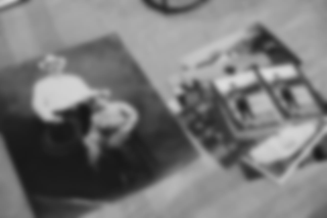 Unger family pictures sit atop a table at the Unger family home on the McCandless Ranch, Wed, Jan. 16, 2019, in Hookena, Hawaii. Max Unger grew up on the 7000 acre working cattle ranch on the slopes of Mauna Loa. (Marco Garcia for the New Orleans Saints)