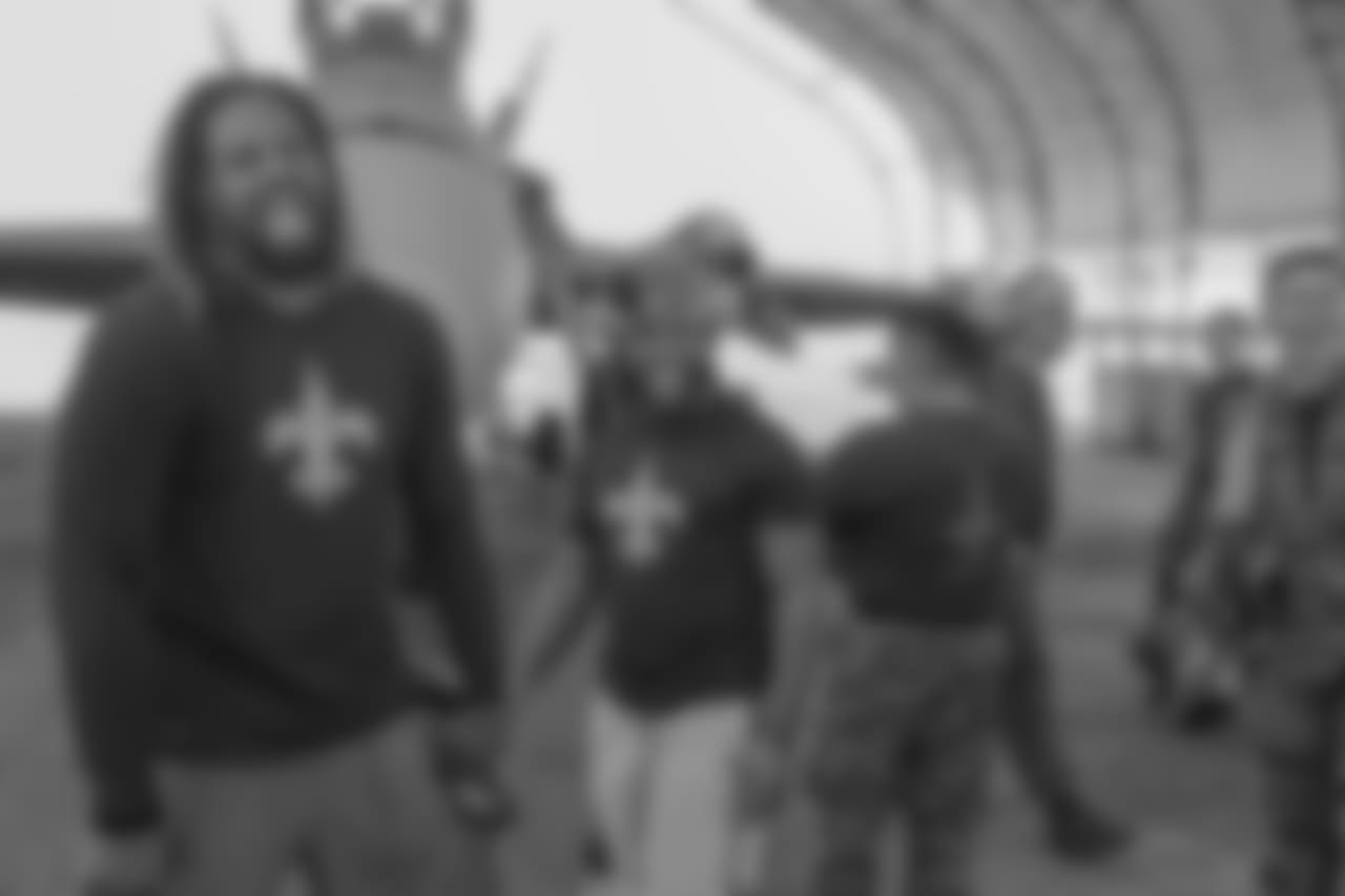 New Orleans Saints players visit with service men and women as well as tour the facilities at Naval Air Station Joint Reserve Base in Belle Chasse on October 30, 2018 as part of NFL "Salute to Service" week and a USAA initiative.