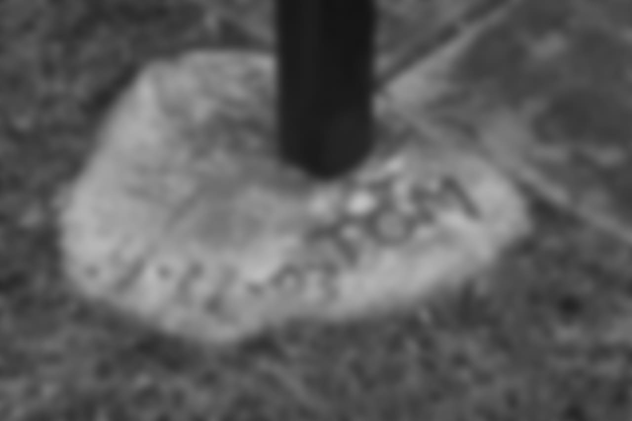 A detail view of Thomas writing his name at the base of a basketball hoop in the childhood home in the hometown of New Orleans Saints punter Thomas Morstead in Pearland, Texas.