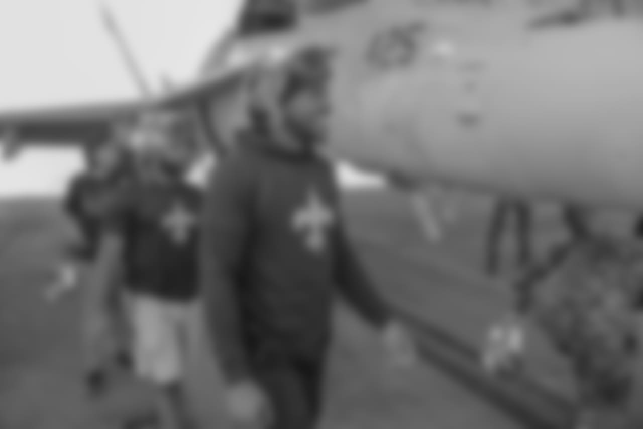 New Orleans Saints players visit with service men and women as well as tour the facilities at Naval Air Station Joint Reserve Base in Belle Chasse on October 30, 2018 as part of NFL "Salute to Service" week and a USAA initiative.