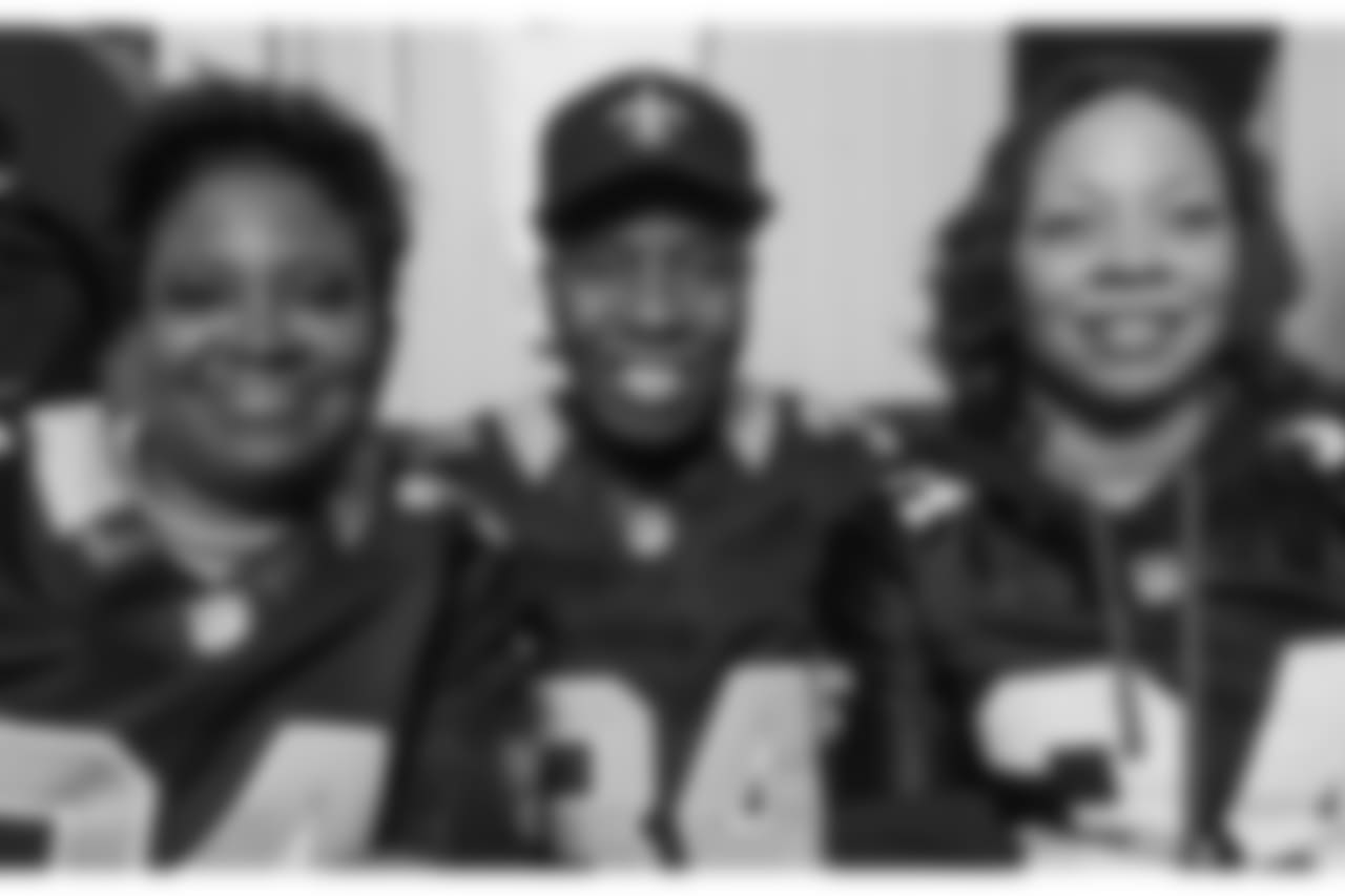 The family of Justin Hardee and assorted memorabilia from his college and pro days.
From left; aunt Wanda Shoulders, dad Arthur Hardee, sister Ebony Drummer.