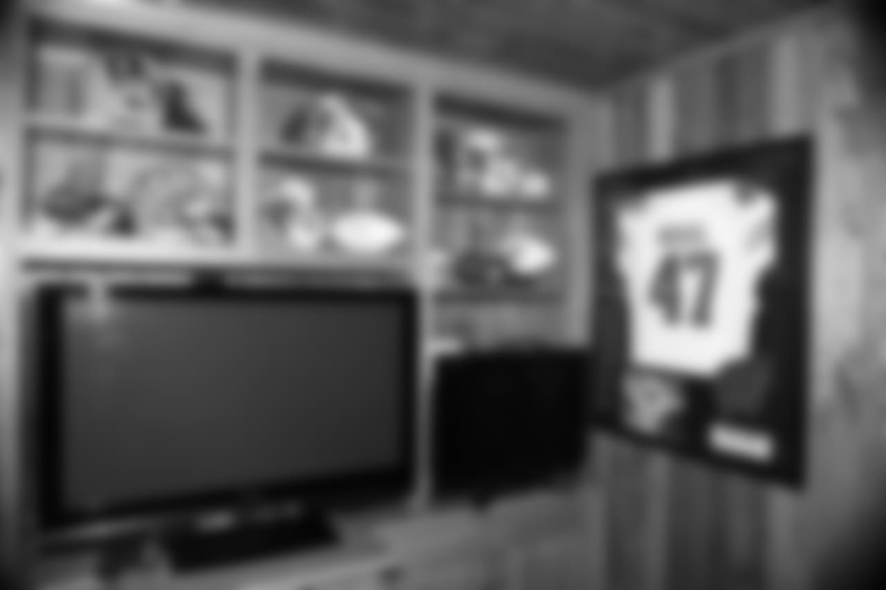Vince Biegel's college uniform displays proudly in the Biegel home