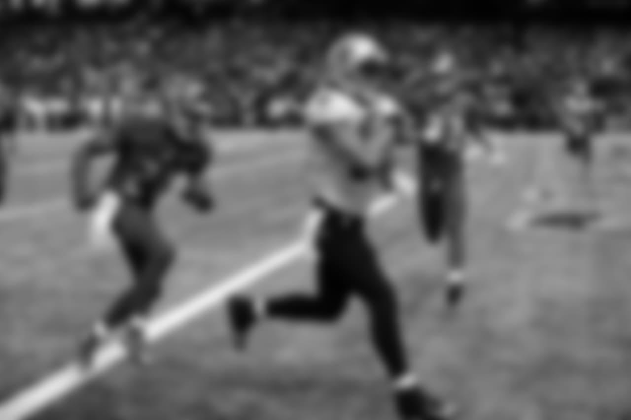 FILE - In this Sept. 20, 2015, file photo, New Orleans Saints wide receiver Willie Snead scores on a touchdown reception in front of Tampa Bay Buccaneers cornerback Alterraun Verner (21) during an NFL football game in New Orleans. Saints coach Sean Payton sees several similarities between one of his favorite former New Orleans receivers, Lance Moore, and Snead, who has burst onto the scene with the Saints this year. Both pass-catchers play in the Superdome on Monday night when the Detroit Lions pay a visit. (AP Photo/Bill Haber, File)