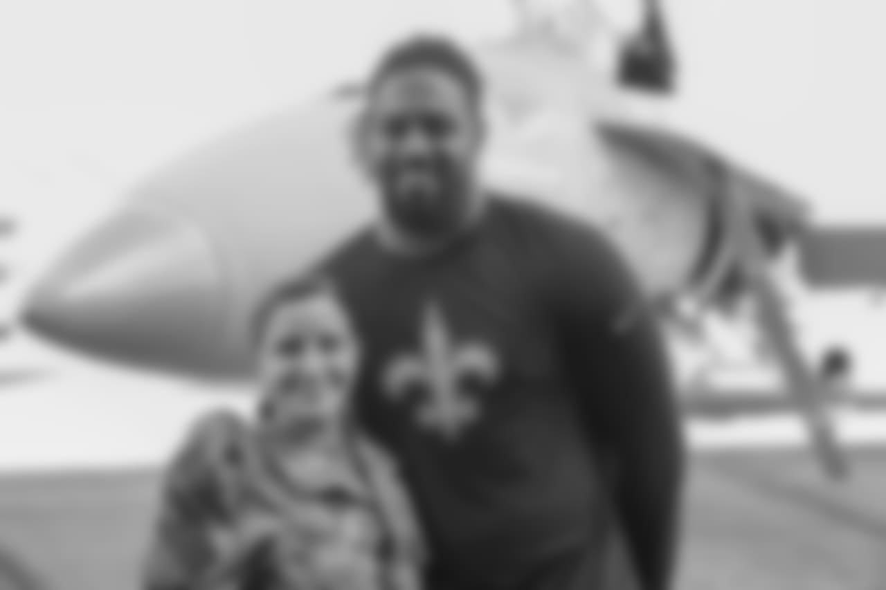 New Orleans Saints players visit with service men and women as well as tour the facilities at Naval Air Station Joint Reserve Base in Belle Chasse on October 30, 2018 as part of NFL "Salute to Service" week and a USAA initiative.