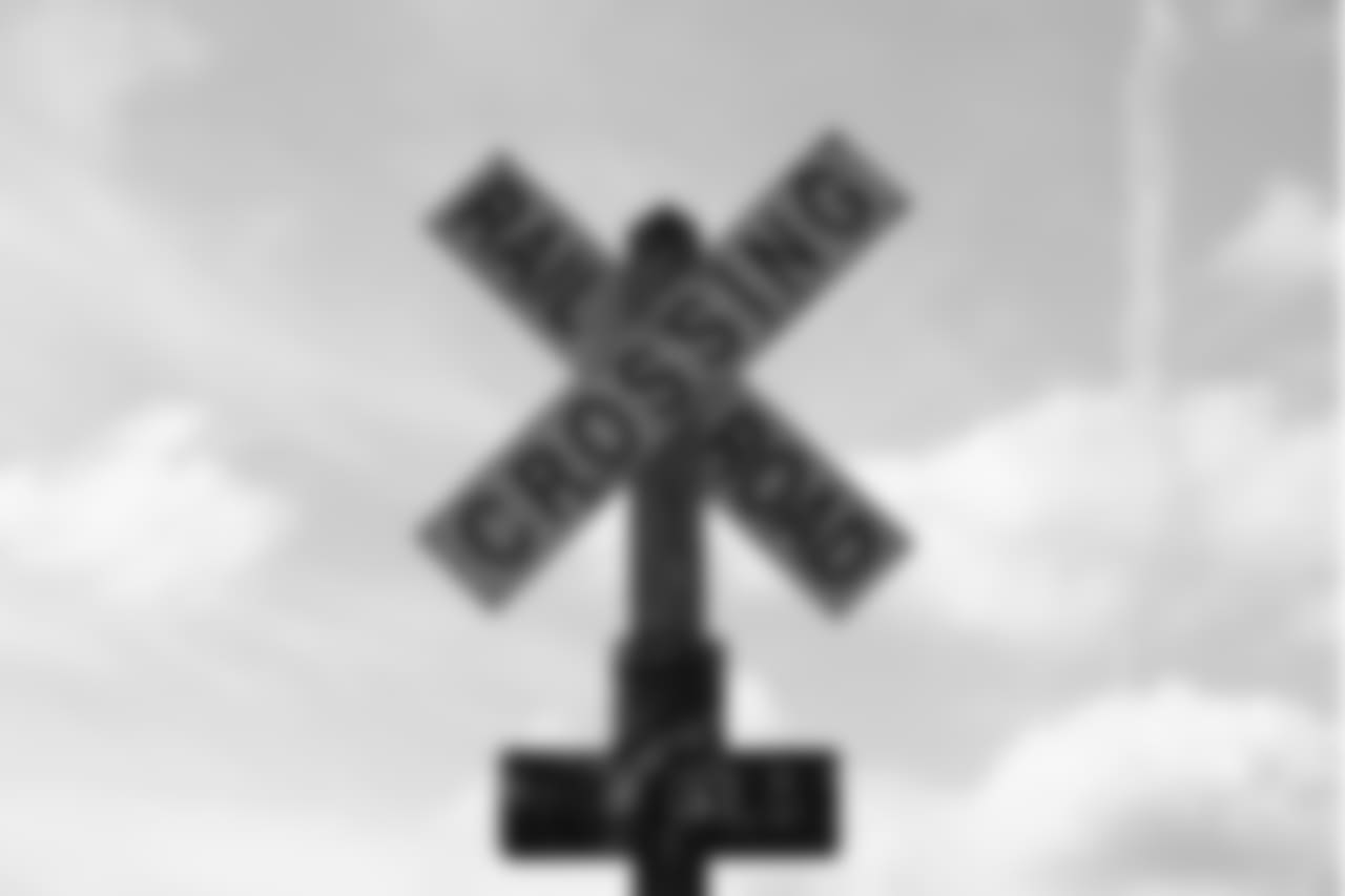 A detail view of a railroad crossing sign by the Southern Pacific railroad is seen in the hometown of New Orleans Saints punter Thomas Morstead in Pearland, Texas.