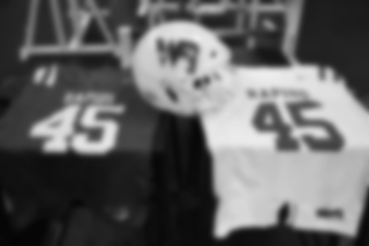 Vince Biegel's helmet and jersey's are displayed from his high school in Wisconsin Rapids, Wisconsin.
