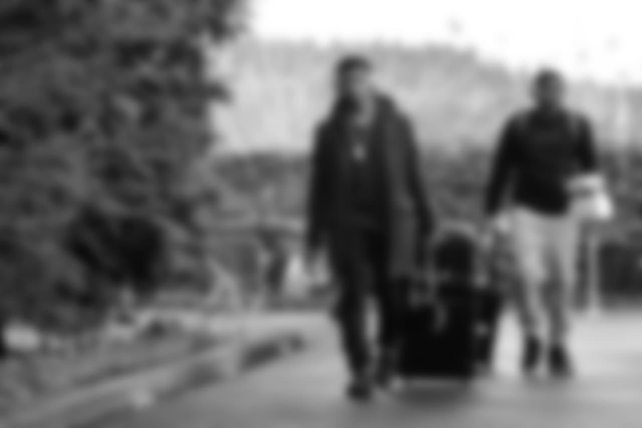 Seahawks Russell Wilson and DeShawn Shead walk from the practice facility to the buses for the start of the road trip to Dallas to face the Cowboys in Week 16.