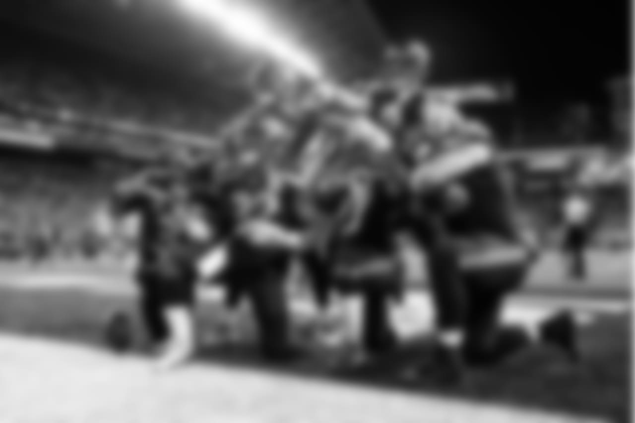 Seahawks Russell Wilson, Chris Carson, David Moore, Mike Davis, Nick Vannett and Justin Britt pose for the Sunday Night Football cameras after Carson's touchdown late in the game gave Seattle a ten point lead.