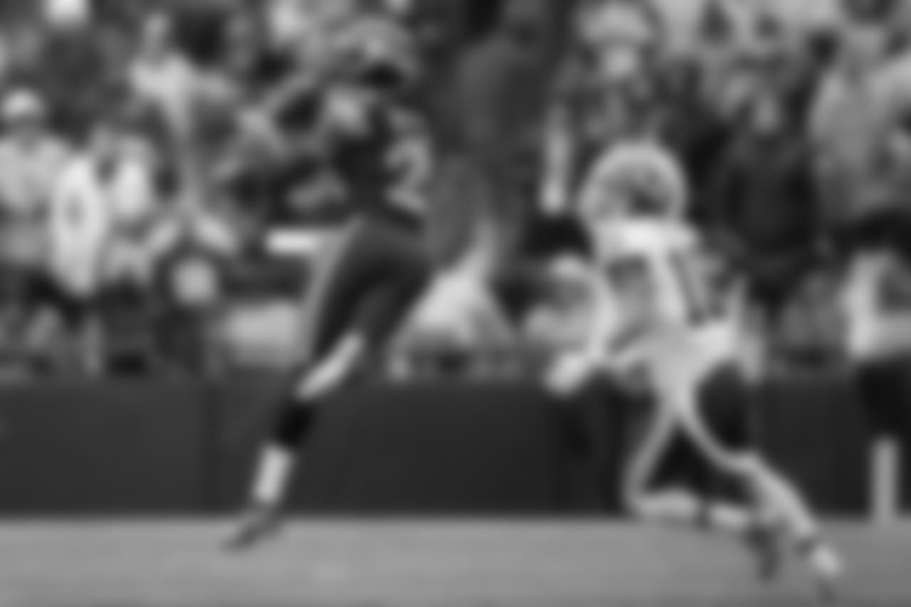 Seattle's Richard Sherman can't hang onto an interception in front of Washington's Josh Doctson in the first half.