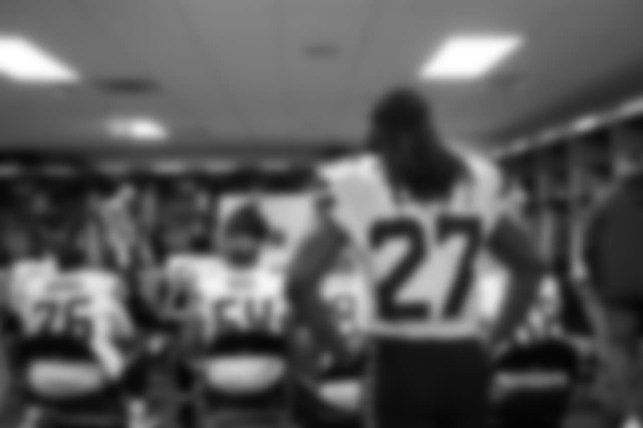 At halftime, Eddie Lacy and offensive teammates paid attention as assistant coach Tom Cable diagrammed on the white board in the locker room.