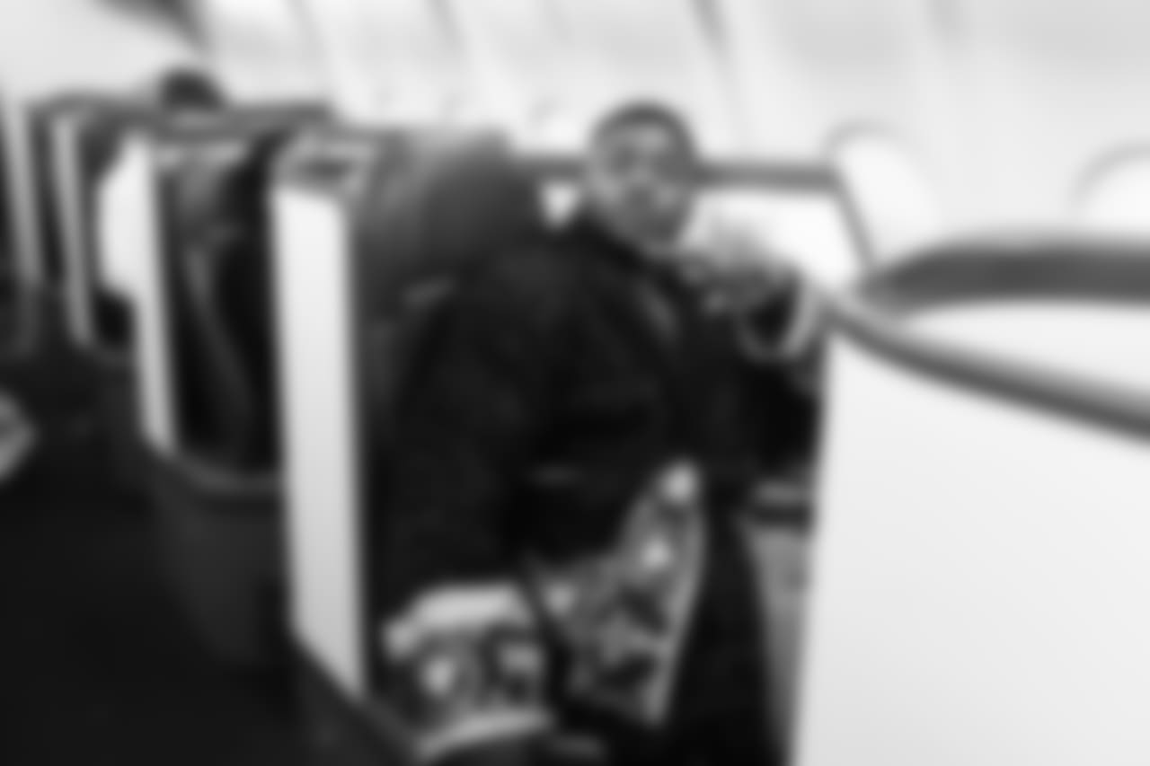 Defensive tackle Jarran Reed sports a robe befitting his first class seat for the victorious flight back to Seattle.