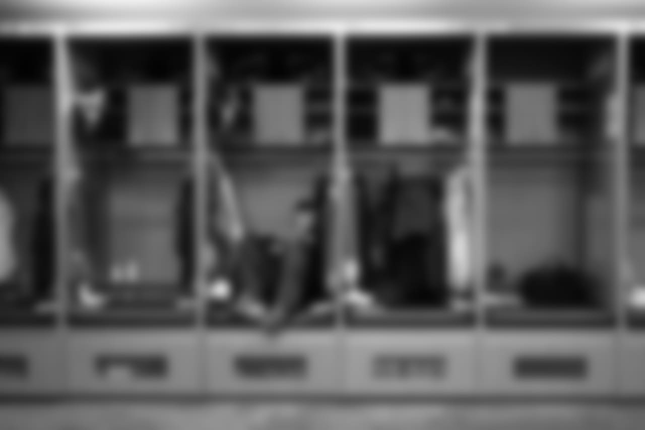 Kicker Sebastian Janikowski finds a moment of quiet in his locker hours before the kickoff of Sunday Night Football before the game.