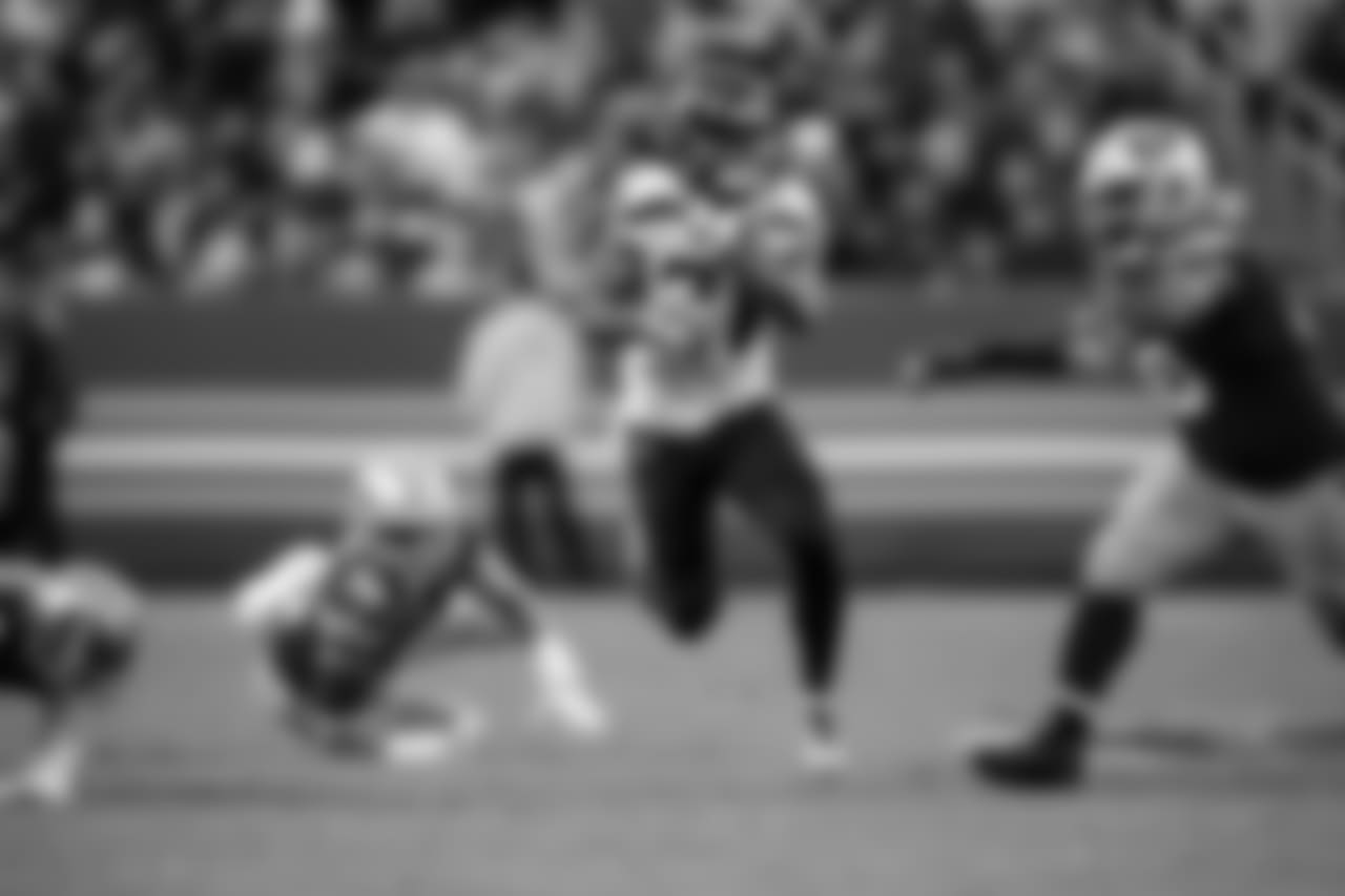 Seattle's J.D. McKissic finds open space in the middle of the field during the third quarter.