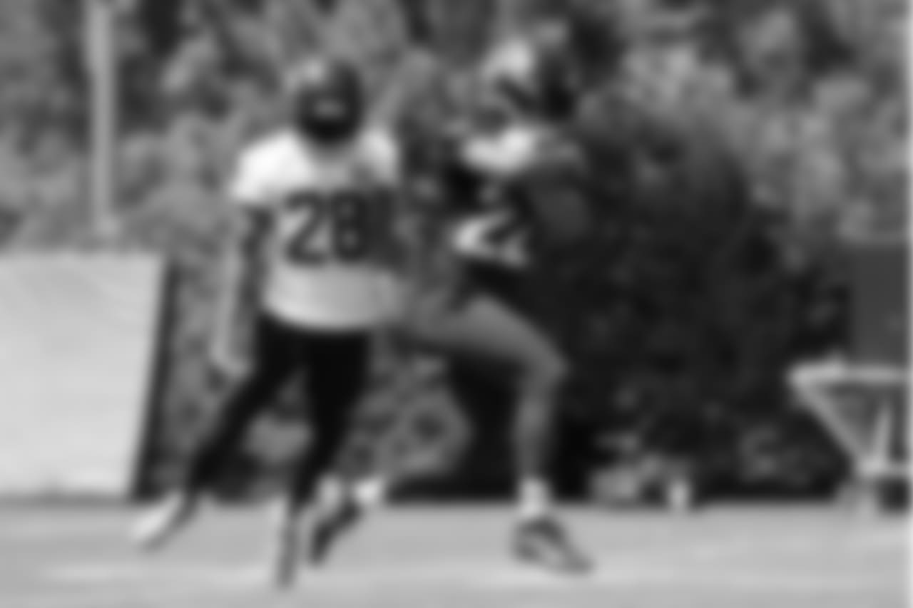 CB Justin Coleman, left, and RB C.J. Prosise.