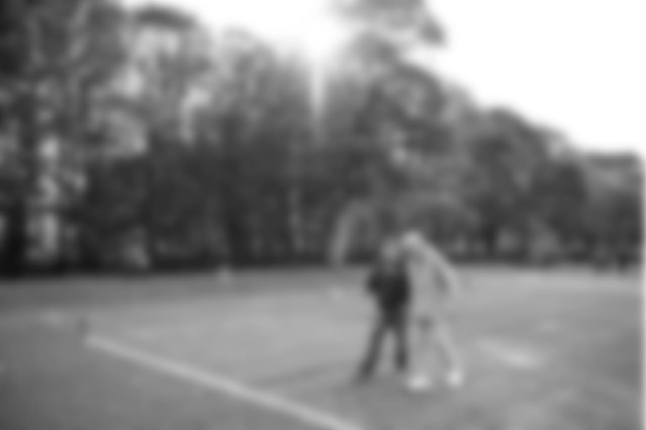 General manager John Schneider and head coach Pete Carroll walk off the practice field after practice.
