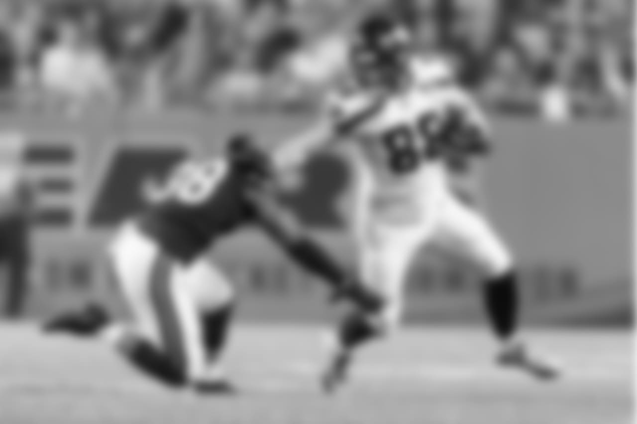 Seahawks tight end Will Dissly offers a stiff arm on a gain in the first quarter.