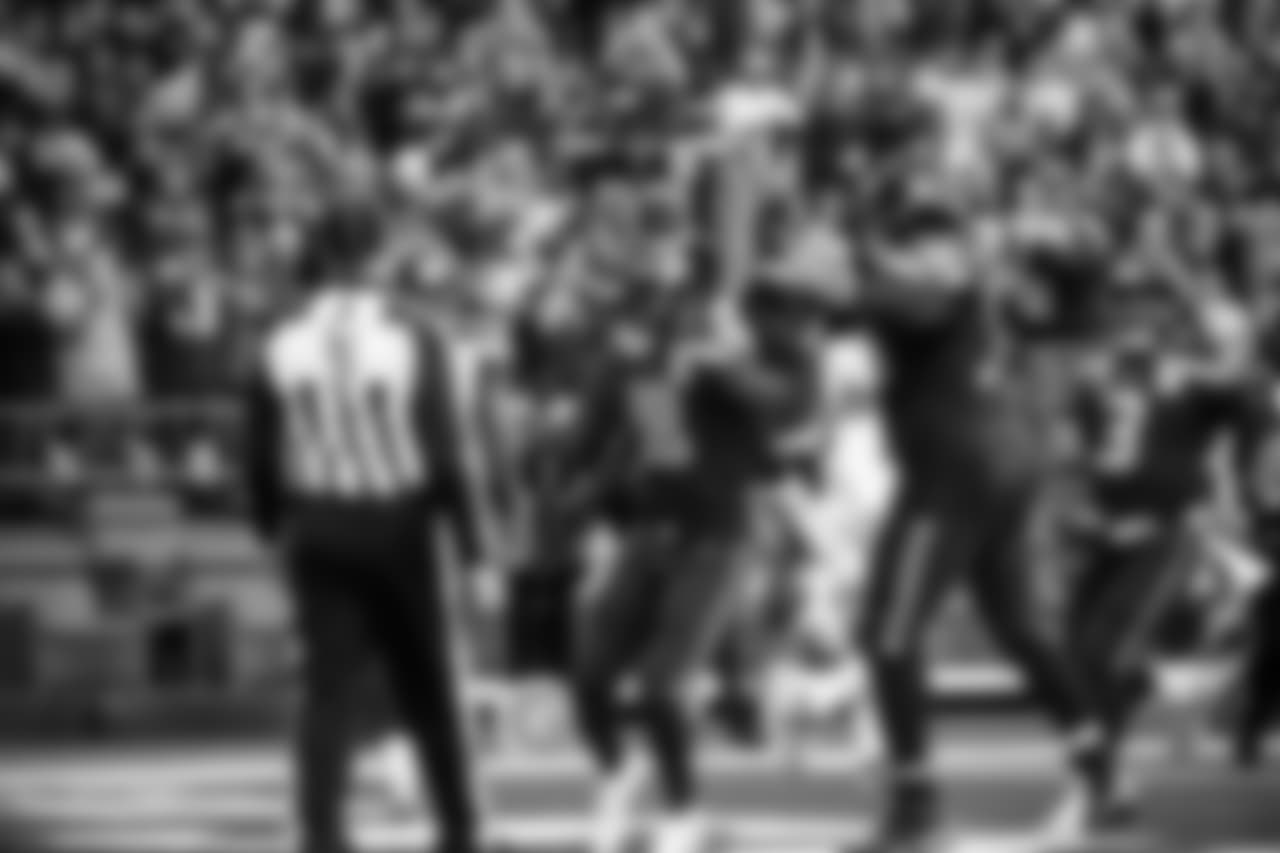 The Seahawks celebrate Jaron Brown's second touchdown of the game, an 18-yard completion from Russell Wilson.