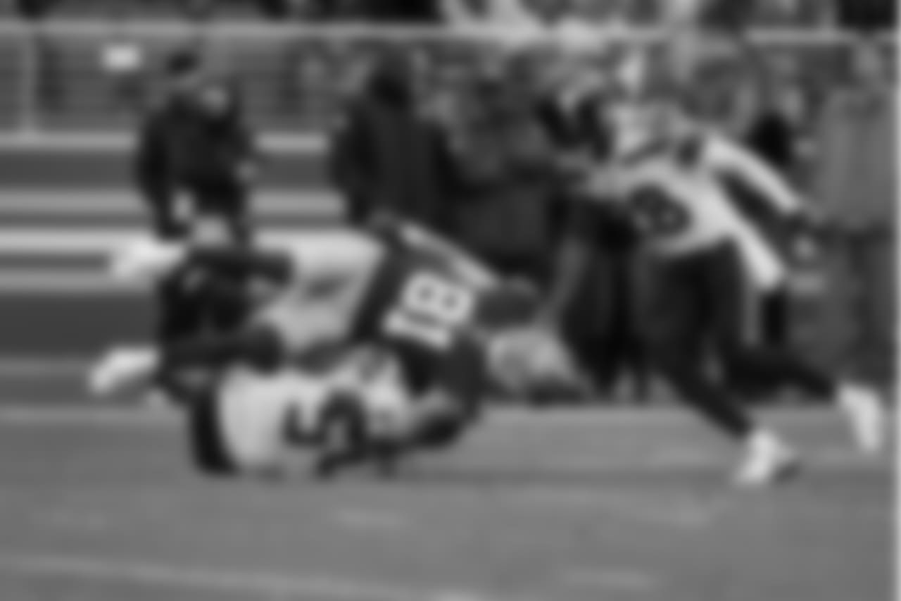 Seahawks linebacker Bobby Wagner tackled San Francisco's Trent Taylor, and at the same moment took the ball away from him for an interception.