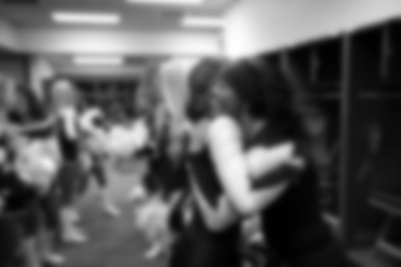 Good luck hugs with teammate Lisa.