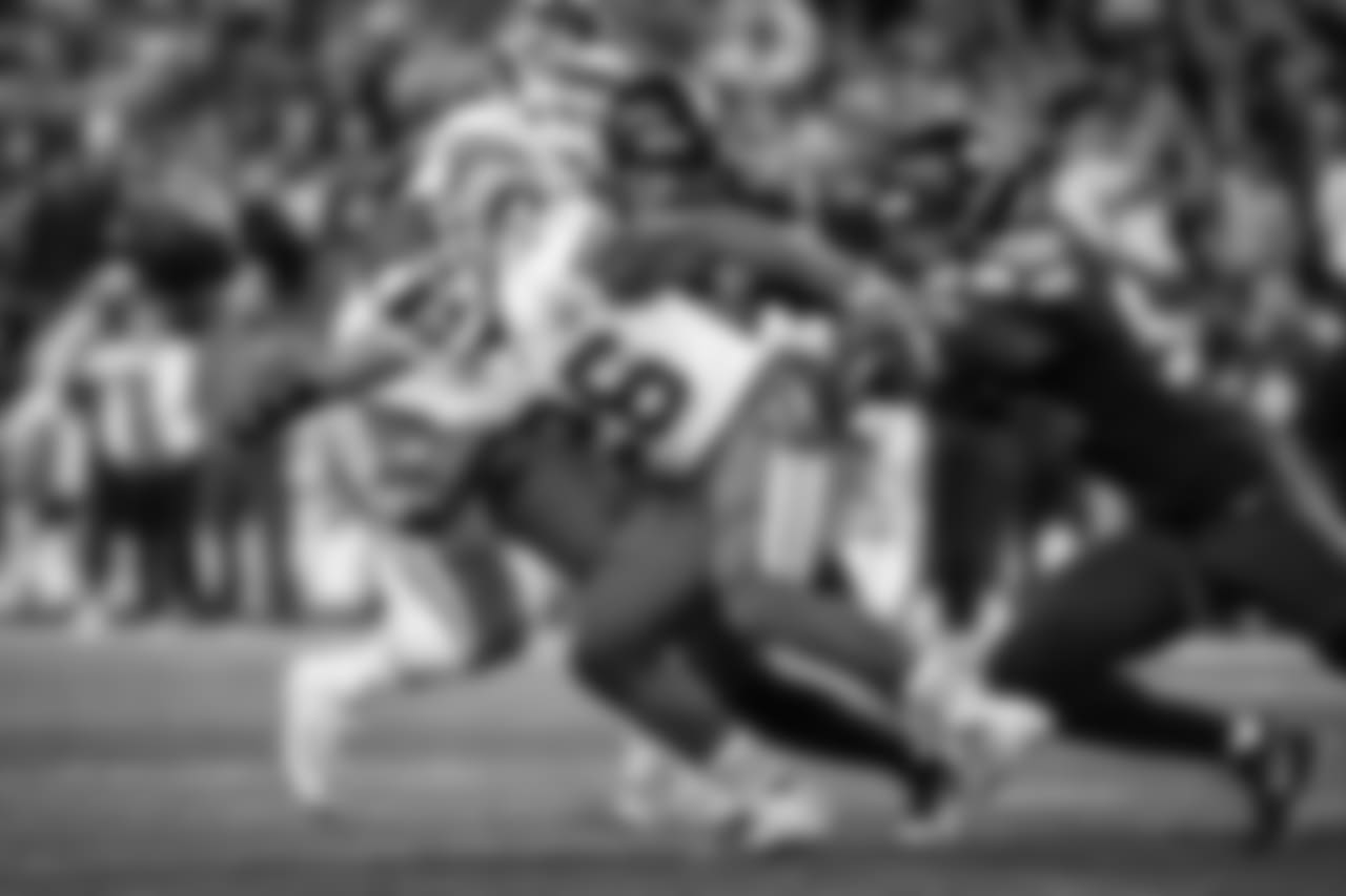 Seahawks defensive end Dion Jordan forces Chiefs running back Damien Williams to fumble in the second quarter.