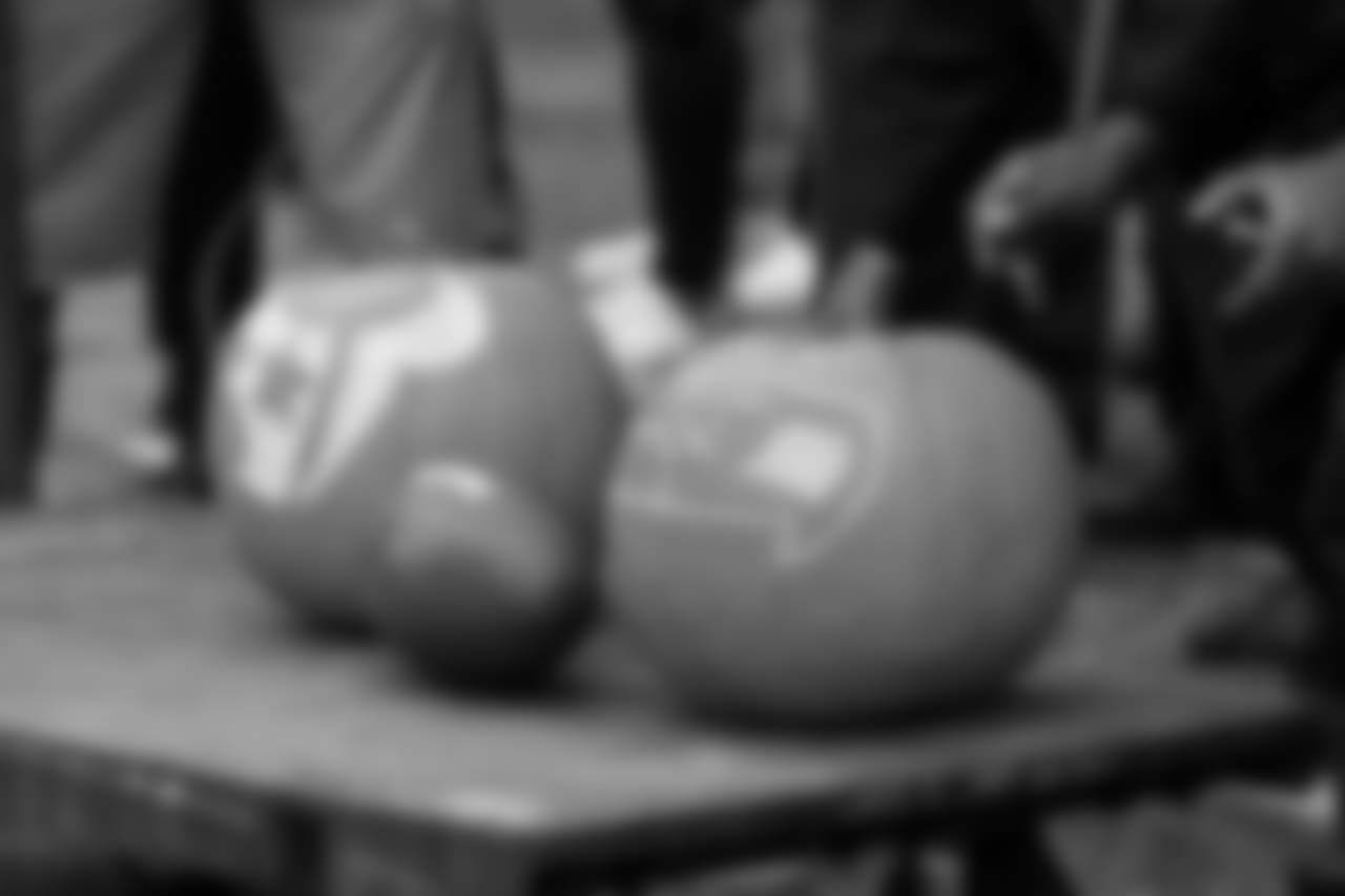 Pumpkins carved with the logos of the Texans and Seahawks are on display before the game.