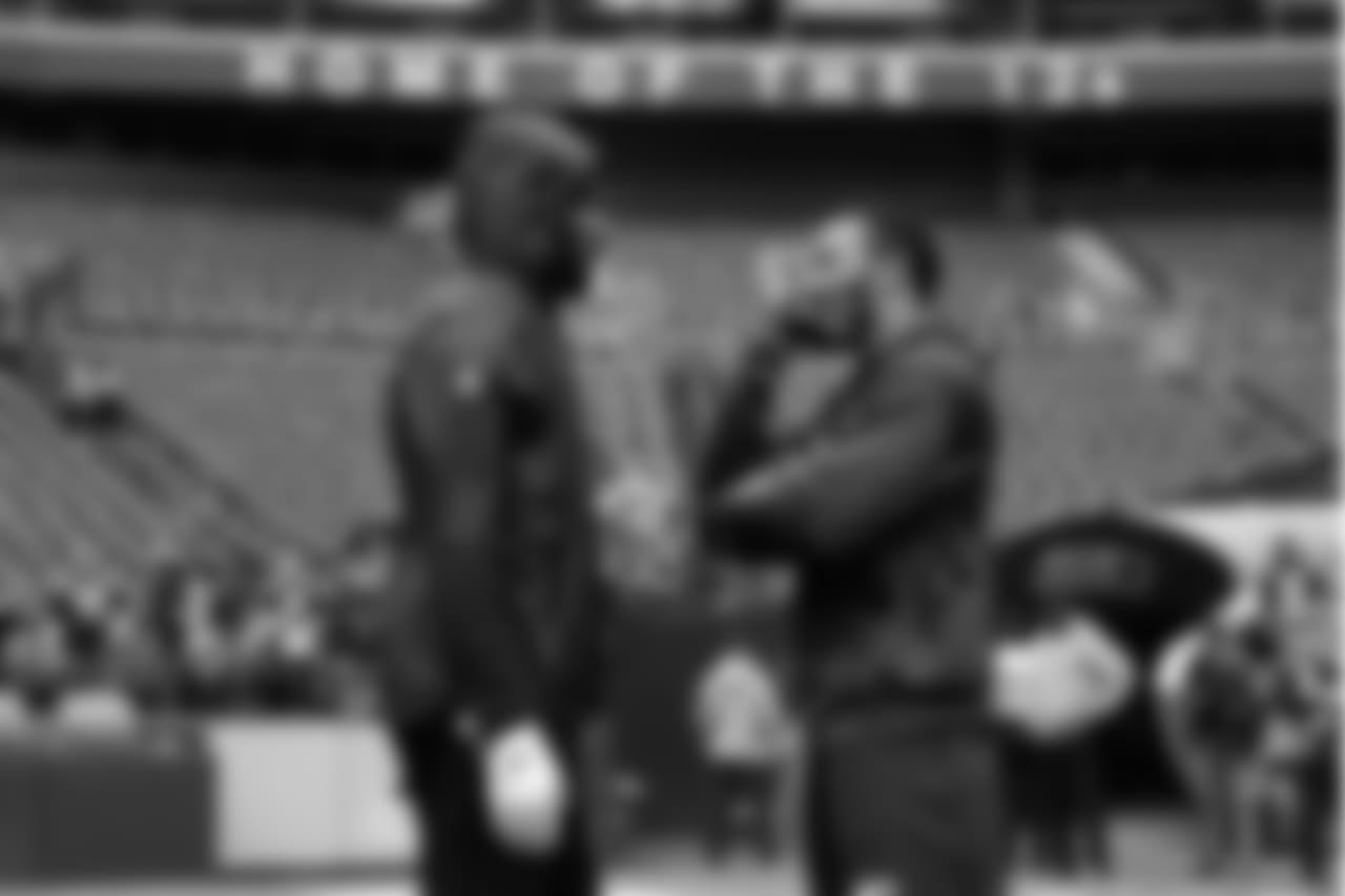 Former teammates and still friends Richard Sherman and Doug Baldwin talk on the field hours before kickoff.