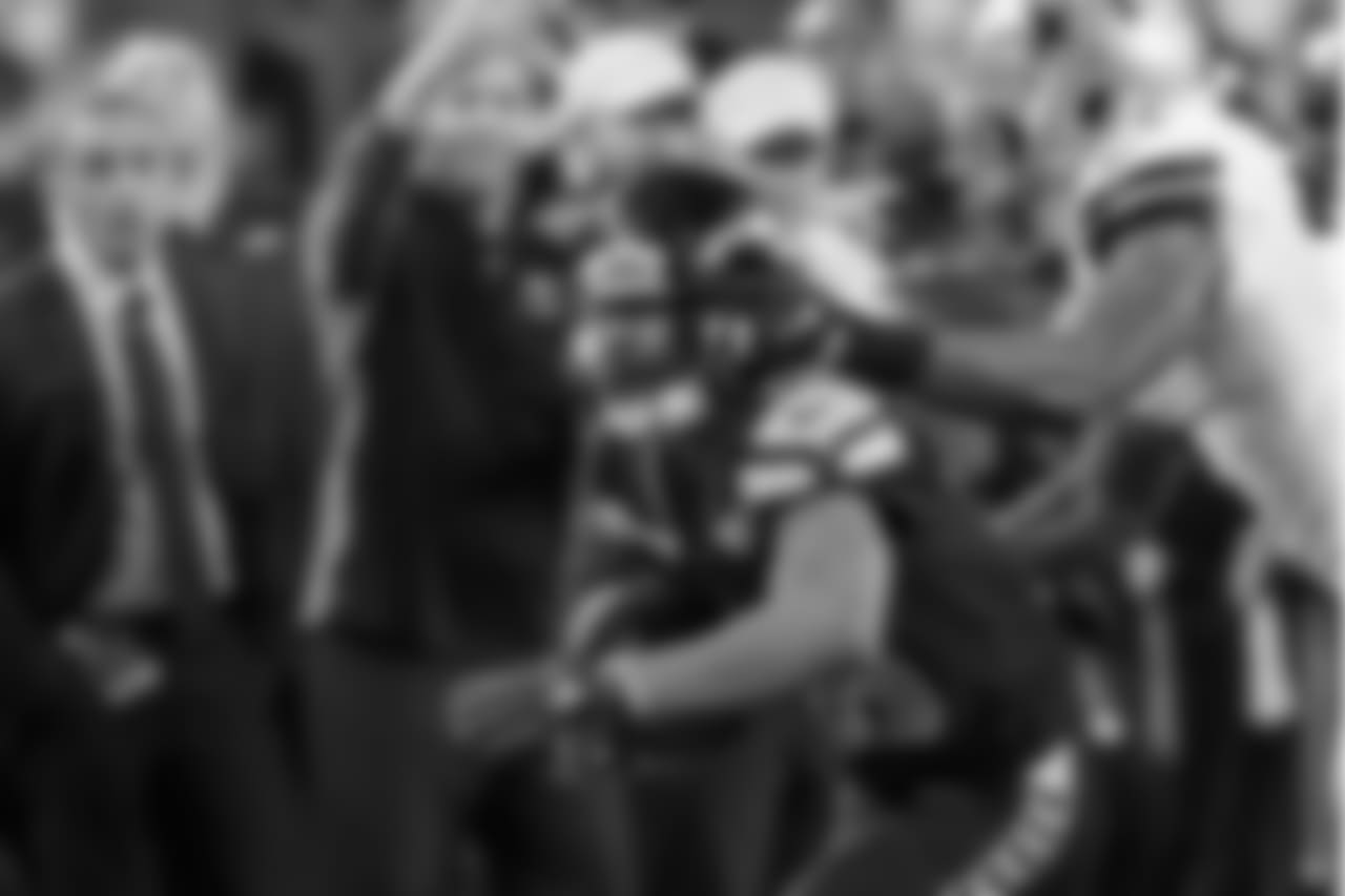 Seattle's Tyler Lockett is on the receiving end of a personal foul face-mask penalty in the red zone in the fourth quarter.