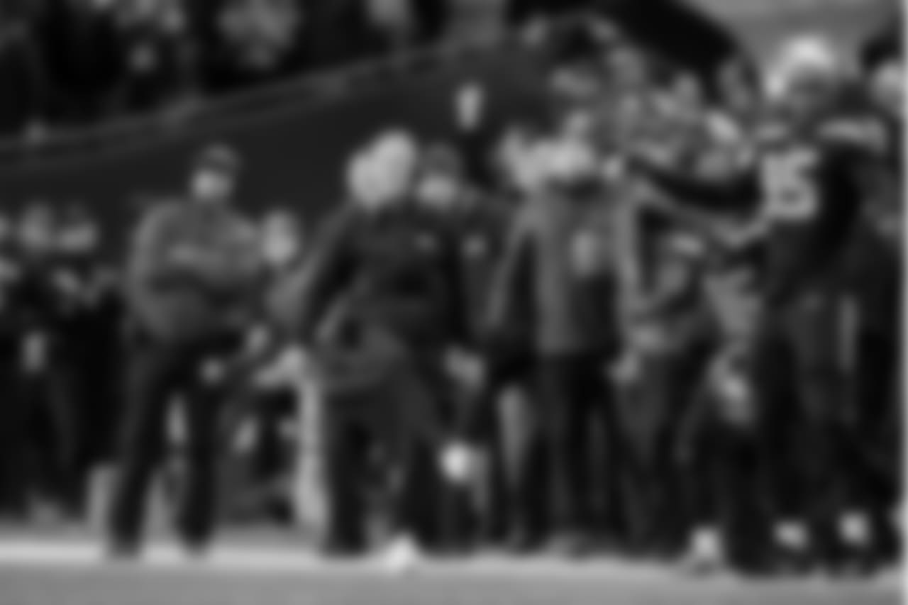 Pete Carroll and the Seahawks sideline react as they watch Blair Walsh's 52-yard field goal attempt in the final seconds.