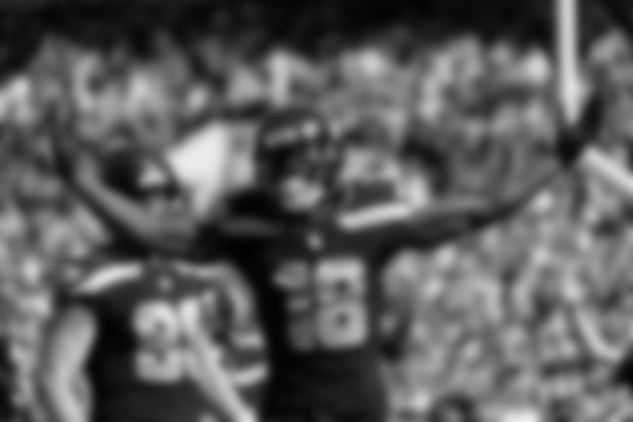 Receiver Jaron Brown celebrates after his touchdown catch.