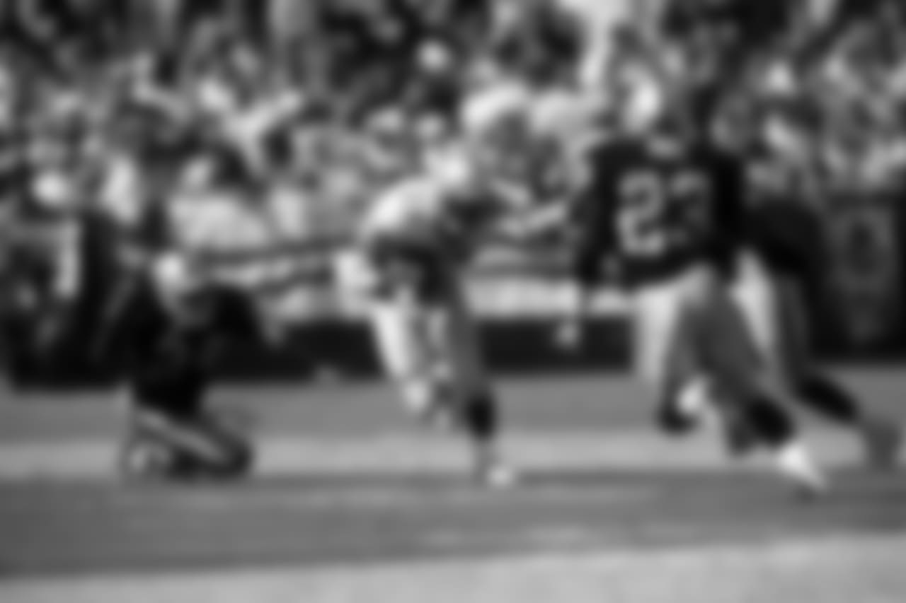 Shaun Alexander #37 of the Seattle Seahawks runs for yardage during an NFL football game against the Oakland Raiders in Oakland, Ca. on September 30, 2001. The Raiders won 38-14. (AP Photo/G. Newman Lowrance)