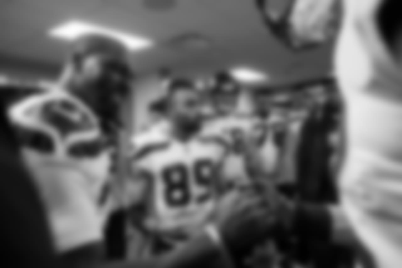 Receiver Doug Baldwin speaks to the team and Jeremy Lane shakes hands with a teammate before the team left the locker room prior to kickoff.