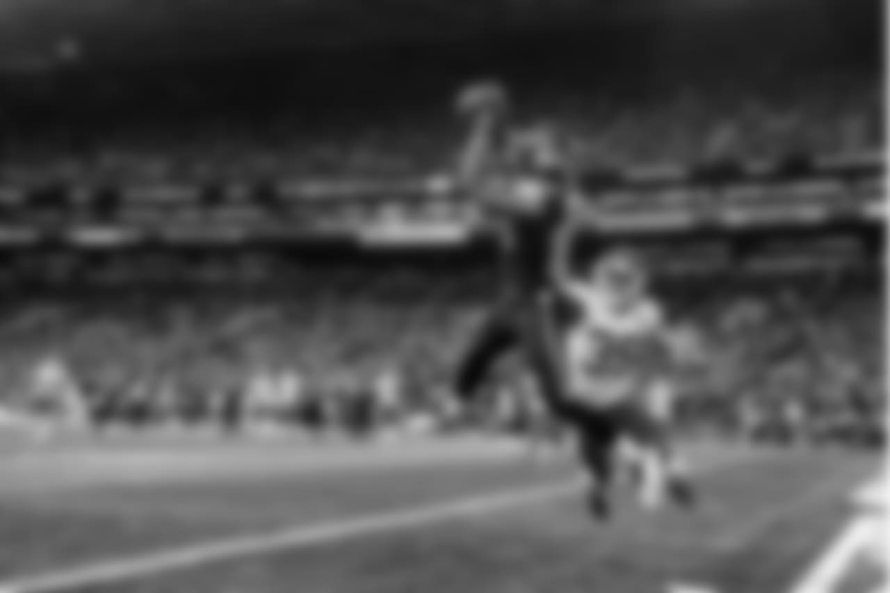 Seahawks receiver David Moore leaps high in the corner of the end zone but was just out-of-bounds upon landing for an incomplete pass.