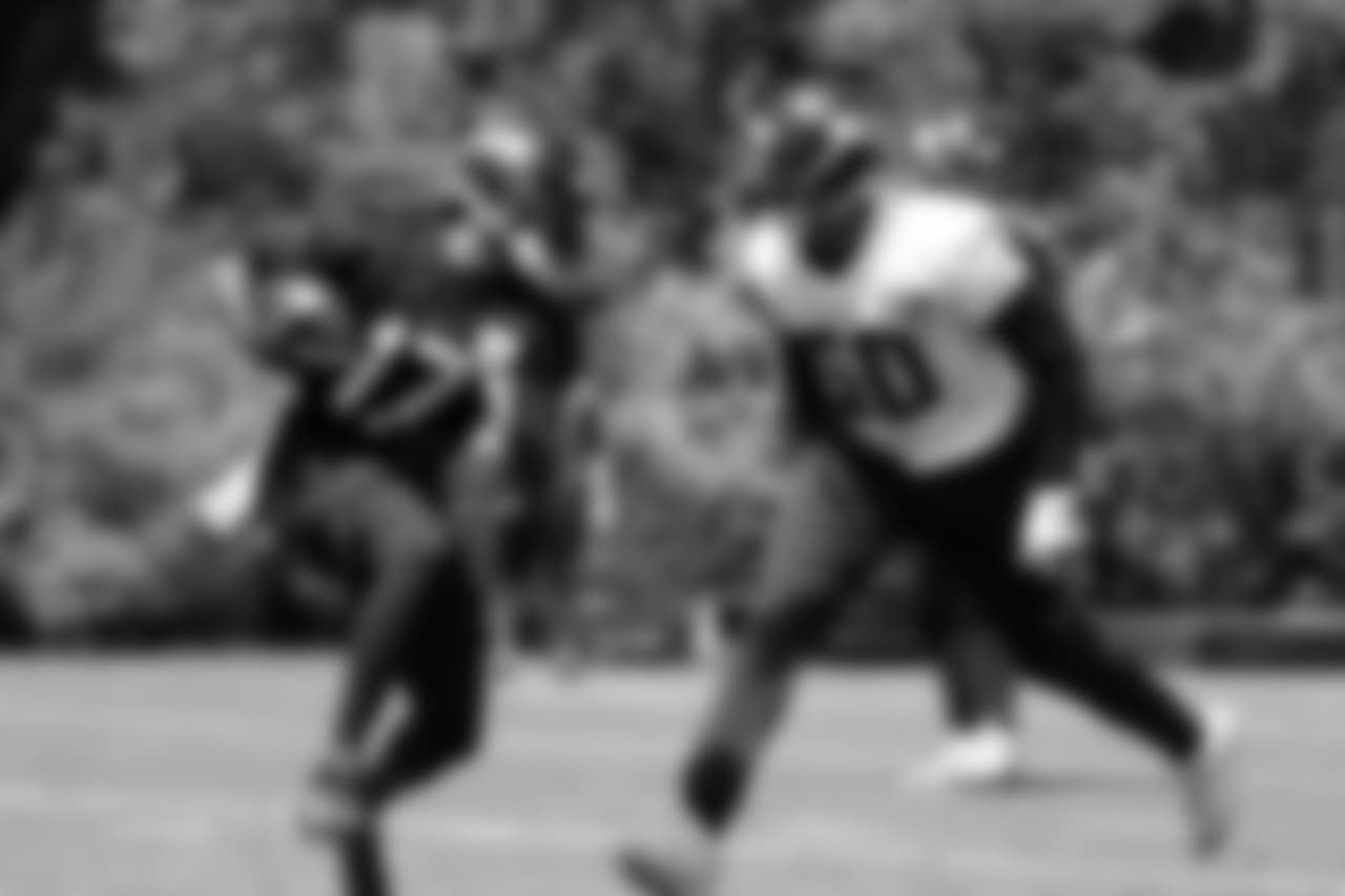 WR Damore'ea Stringfellow, left, and LB K.J. Wright