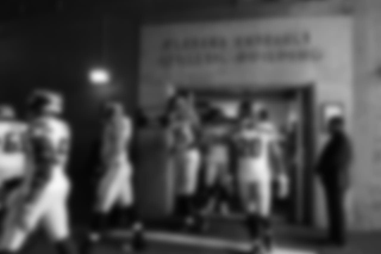 The Seahawks exit the visitors locker room prior to the game.