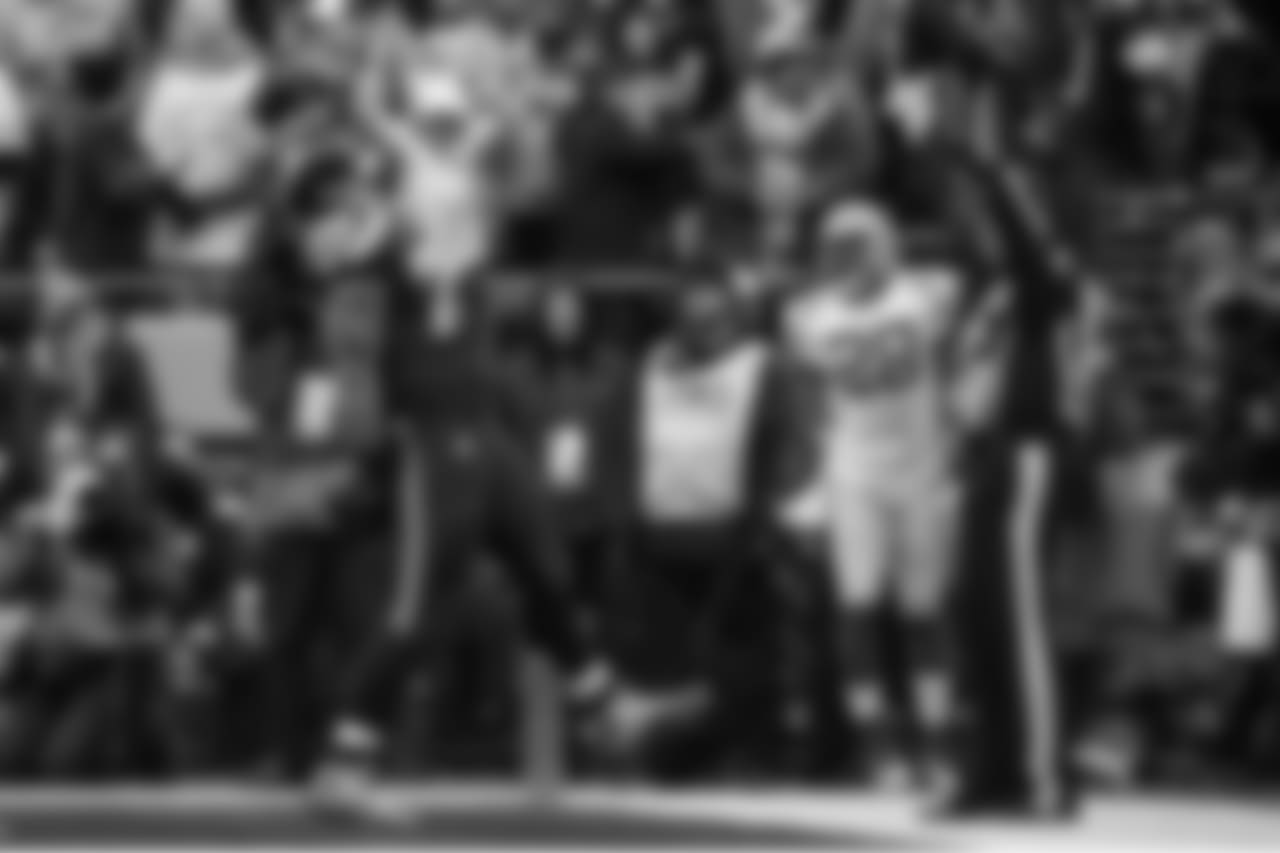 Seattle offensive lineman Garry Gilliam lets out a yell after scoring the Seahawks first touchdown on a fake field goal.