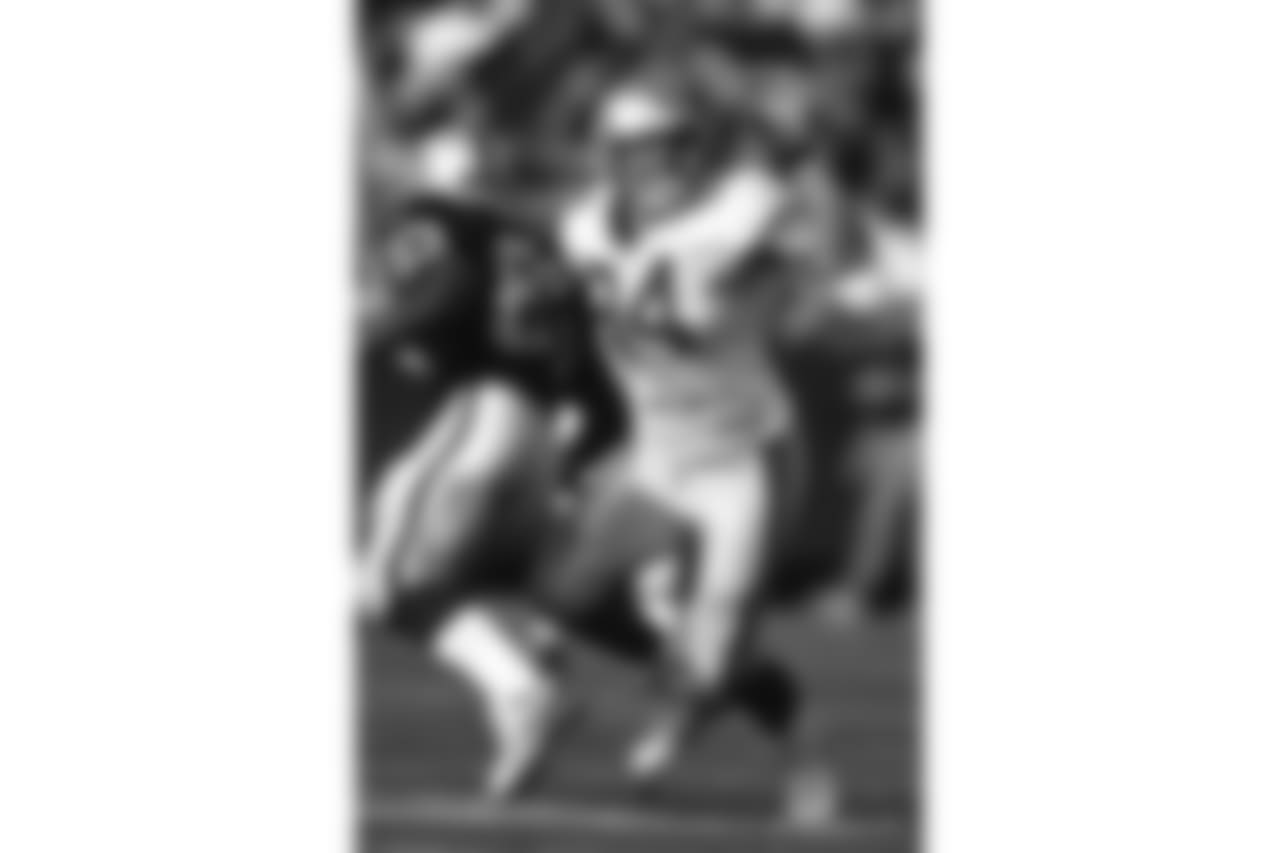 Seattle Seahawks linebacker Chad Brown (94) is seen in action during an NFL game against the Oakland Raiders Nov. 15, 1998, in Oakland, Calif. (Allen Kee via AP)