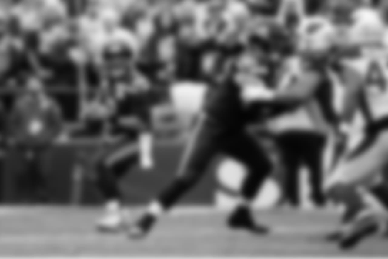 Seahawks quarterback Russell Wilson looks for an open receiver early in the game.