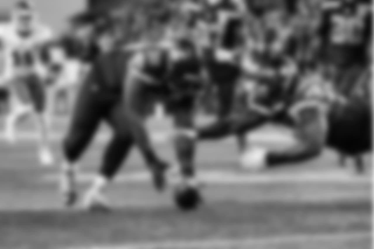 Seattle's Shamar Stephen and Jarran Reed dive to recover a Kansas City fumble in the second quarter.