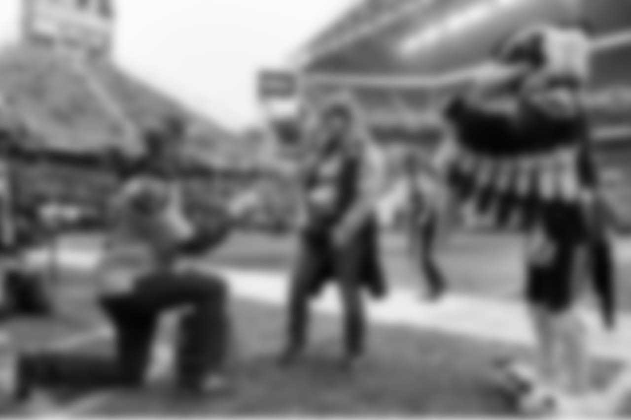 A pregame proposal took place along the sidelines and the bride-to-be said "yes"!