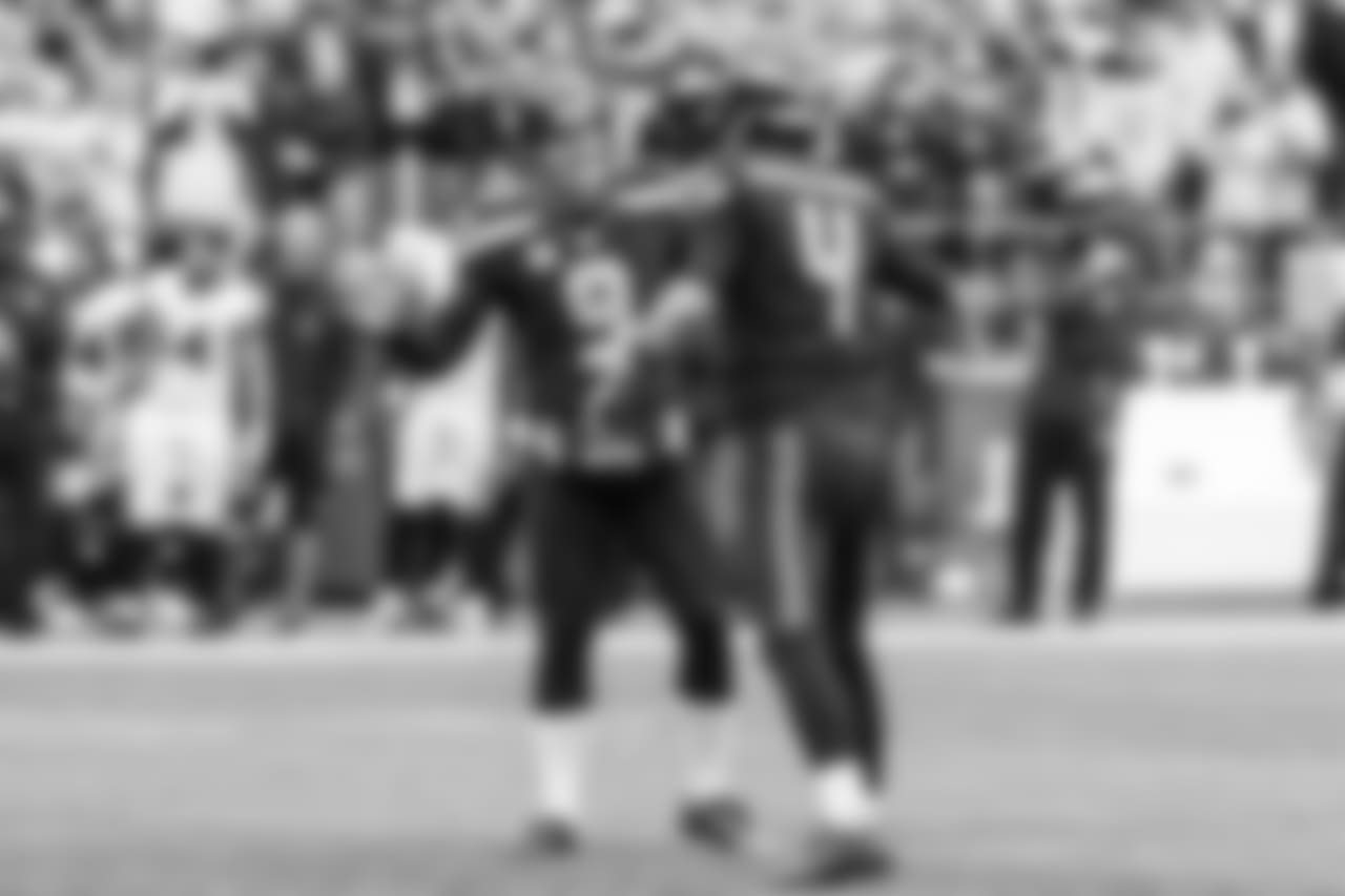 Holder Jon Ryan and kicker Steven Hauschka celebrate after Hauschka's 44-yard field goal gave the Seahawks a 26-24 lead late in the game, sealing the victory.