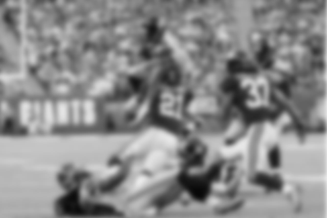 Seattle's Tyler Lockett tries to go up and over the Giants defense in the red zone.