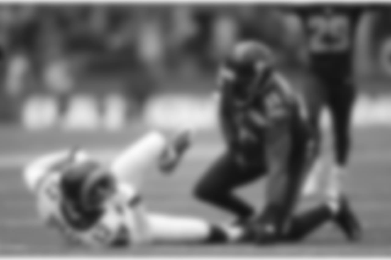 St. Louis Rams' Stedman Bailey (12) gets up after a hard hit by Seattle Seahawks' Kam Chancellor (31) in the first half of an NFL football game, Sunday, Dec. 29, 2013, in Seattle. (AP Photo/John Froschauer)