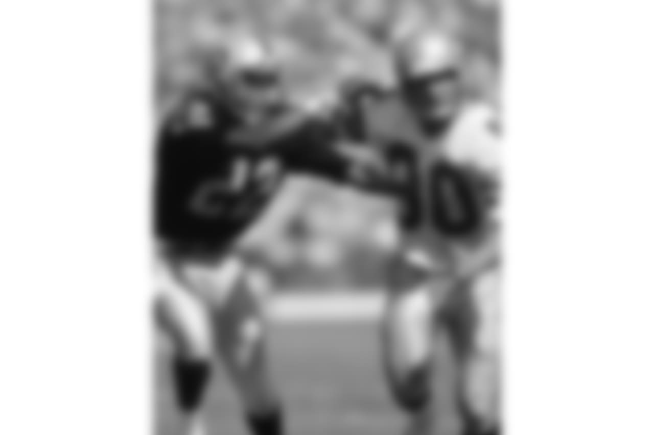 Seattle Seahawks Hall of Fame wide receiver Steve Largent (80) is covered by Los Angeles Raiders Hall of Fame cornerback Mike Haynes (22) during an NFL game, Oct. 7, 1984. The Raiders defeated the Seahawks 28-14. (AP Photo/NFL Photos)