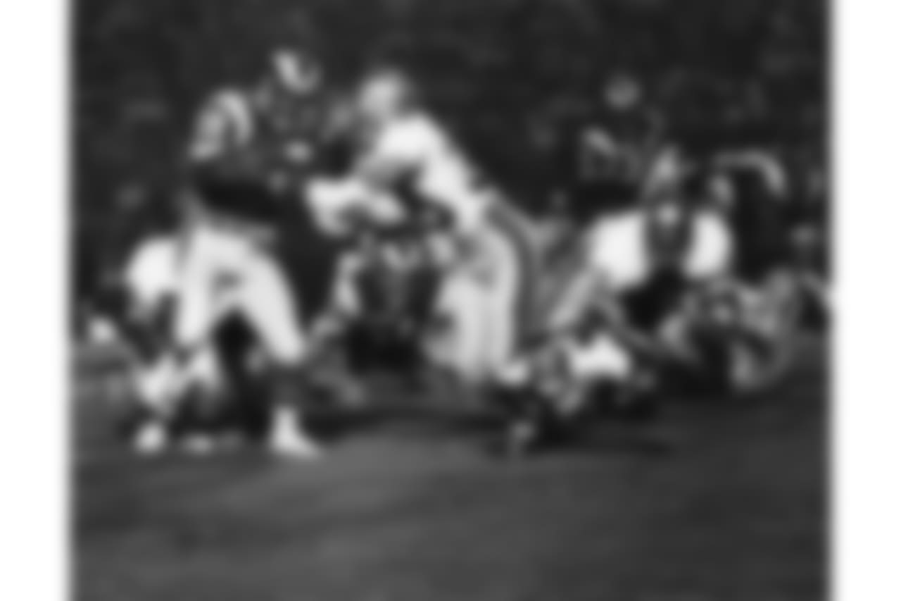 Seattle Seahawks cornerback Cornell Webster (38) stops Los Angeles Rams wide receiver Drew Hill (29) during an NFL pre-season game Aug. 19, 1979 in Los Angeles. The Rams defeated the Seahawks 21-17. (AP Photo/NFL Photos)