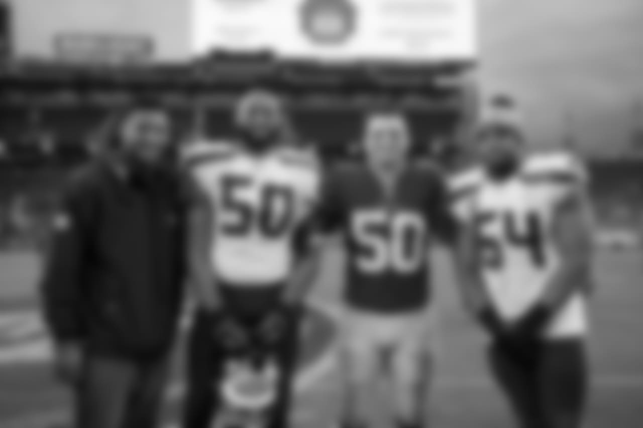 A reunion of current and former Seahawks linebackers took place near midfield after the game with (L-R) Malcolm Smith, K.J. Wright, Brock Coyle and Bobby Wagner.